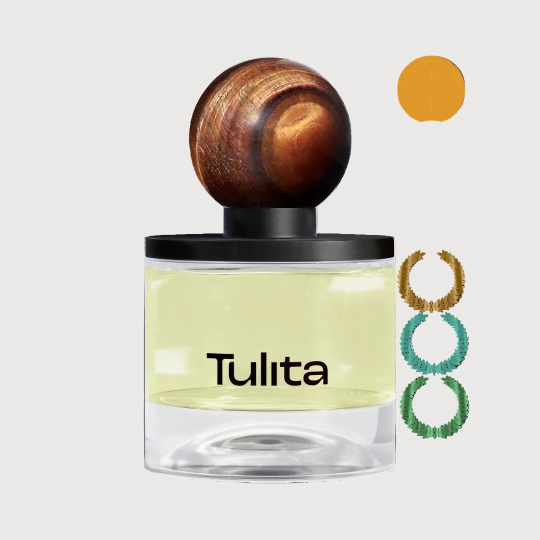 Perfume bottle with wooden cap and 'Tulita' branding on a white background