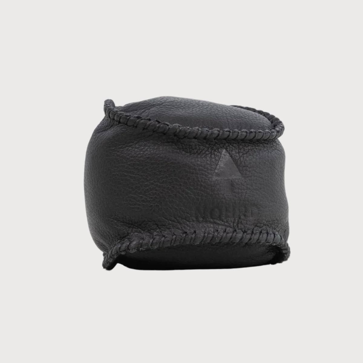 Black camera lens cover with a brand logo on a white background