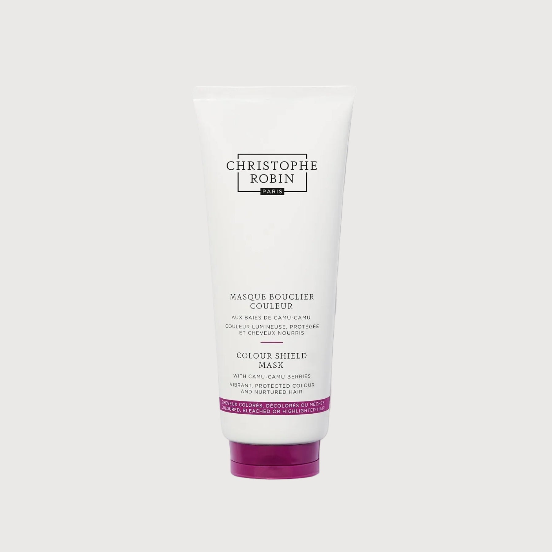 White hair care product tube with purple label on a white background