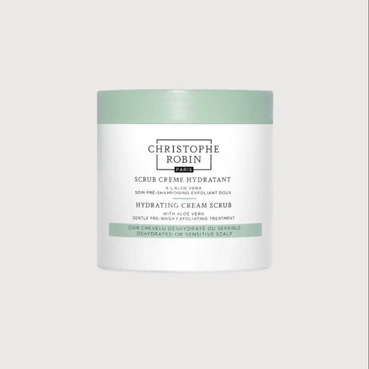 Hydrating cream scrub container with Christophe Robin branding on a white background