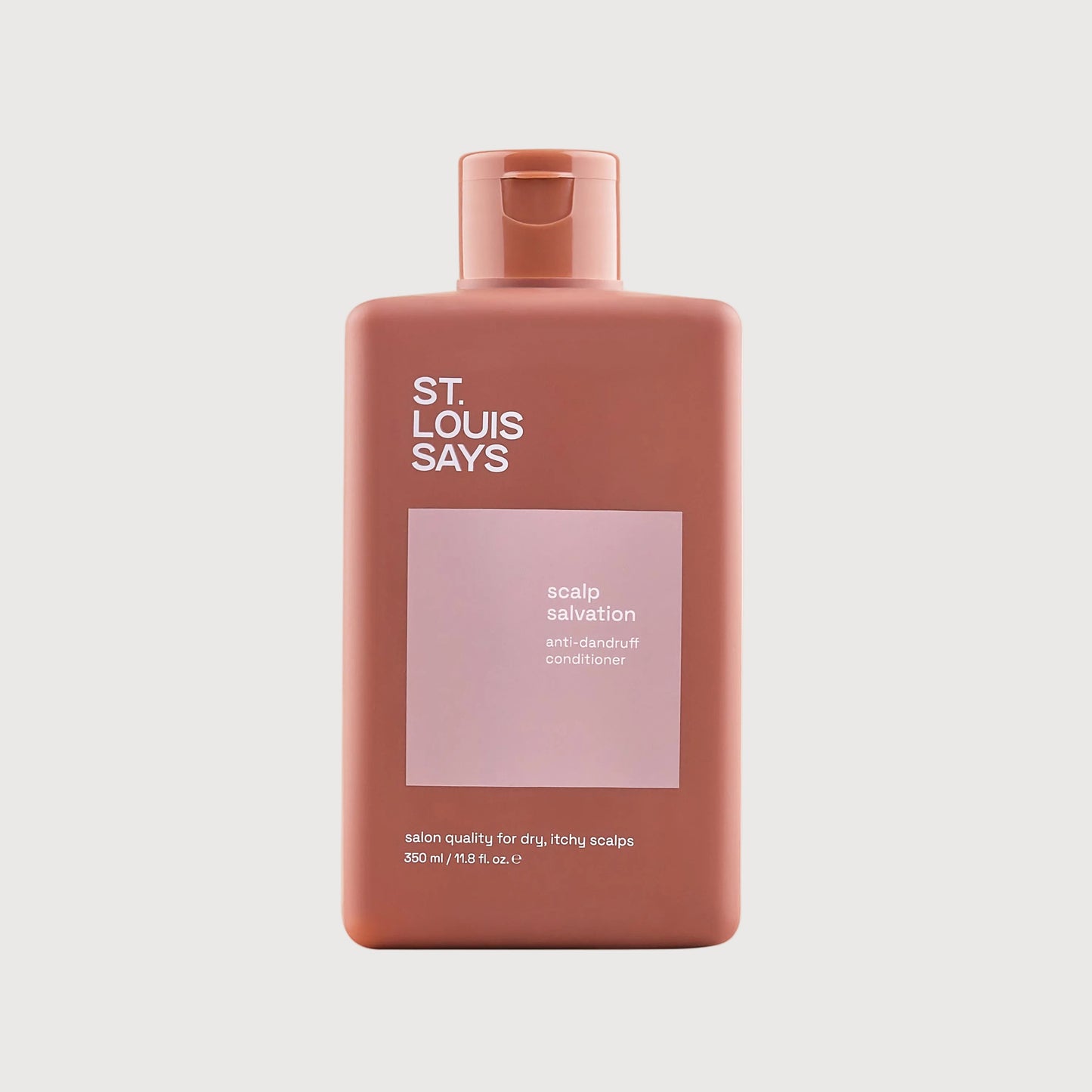 Bottle of 'St. Louis Says' body wash on a light gray background