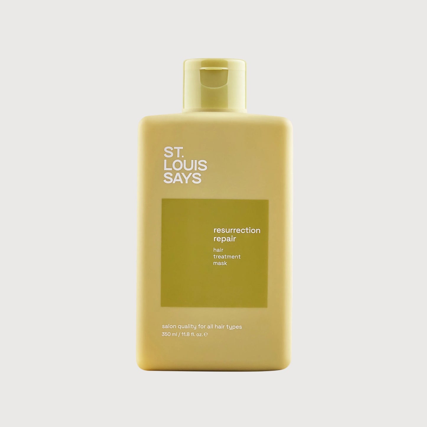 Shampoo bottle labeled 'St. Louis Says' on a white background