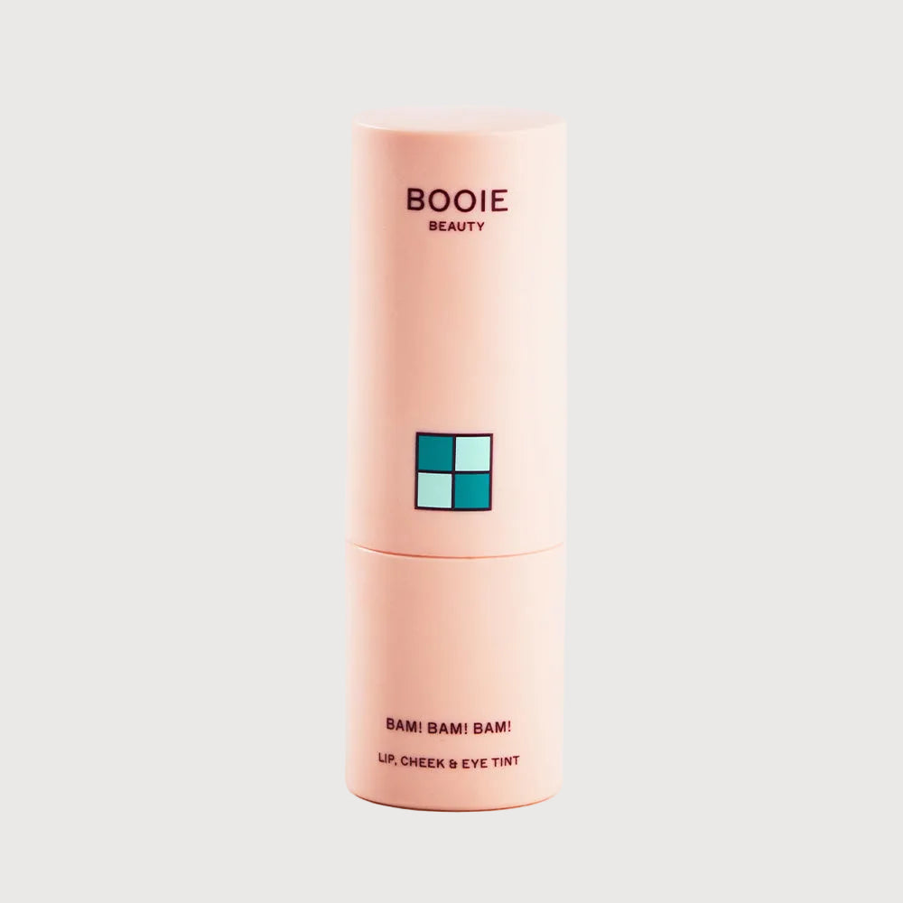 Pink cosmetic tube labeled 'BOOIE BEAUTY' on a white background