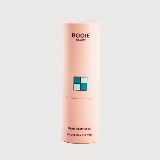 Pink cosmetic tube labeled 'BOOIE BEAUTY' on a white background