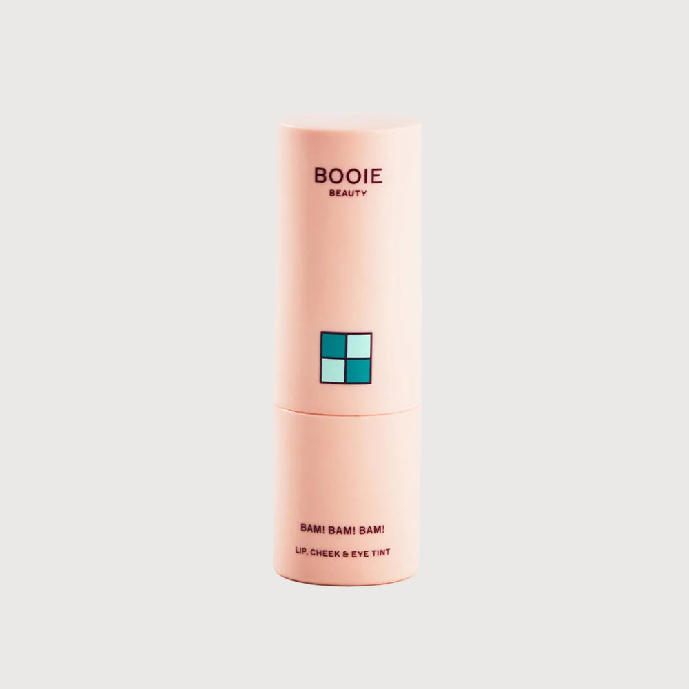 Pink cosmetic tube labeled 'BOOIE BEAUTY' on a white background