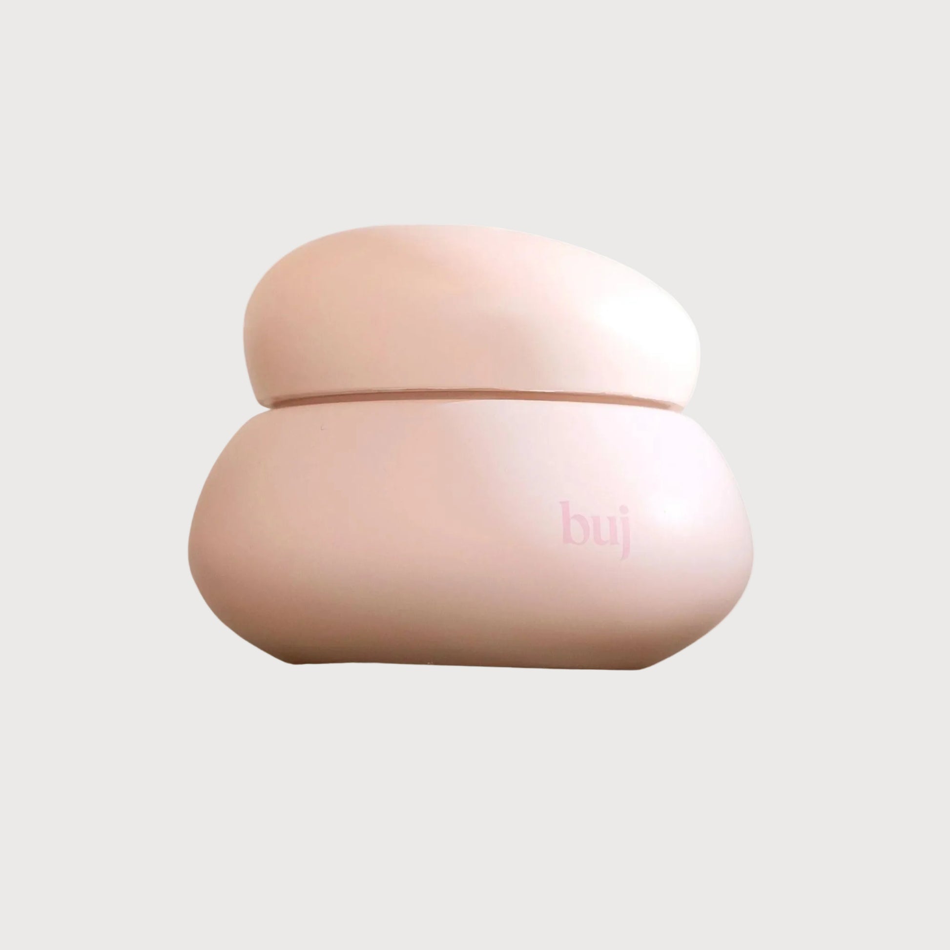 Pink container with buj branding on a grey background