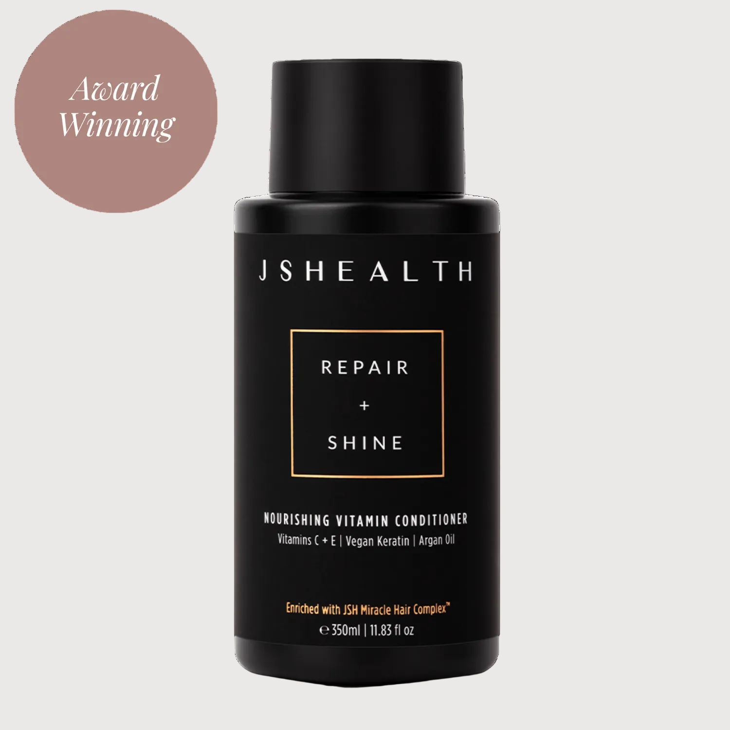 JS Health Repair + Shine conditioner bottle on a white background