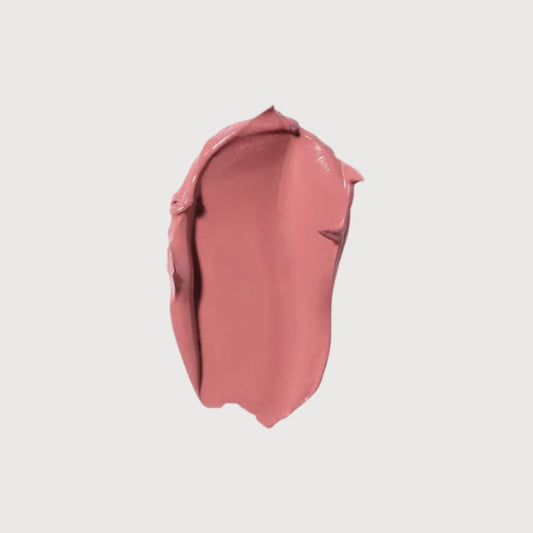 Pink lipstick swatch on a light gray background