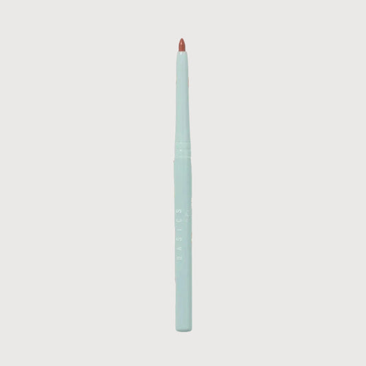 Lip liner with a swatch of color on a light gray background