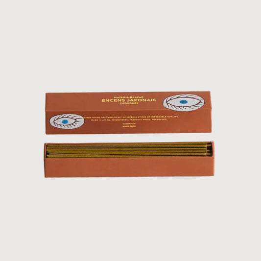 Incense stick packaging with a white background