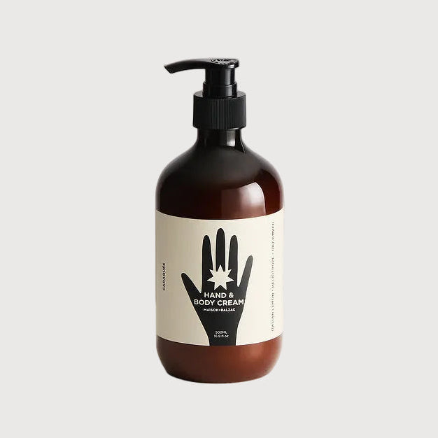 Hand soap bottle with pump on a light gray background