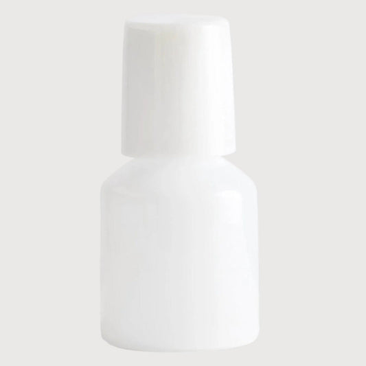 White bottle on a light gray background