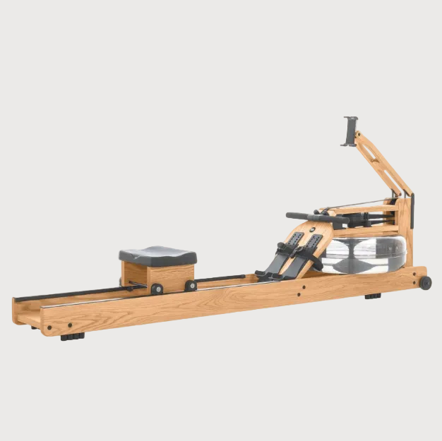 A wooden rowing machine with a black seat, black foot straps, and a clear water tank, shown against a solid white background.
