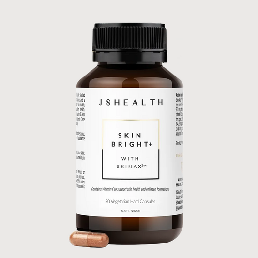 JSHealth Skin Bright+ supplement bottle with a white label on a white background