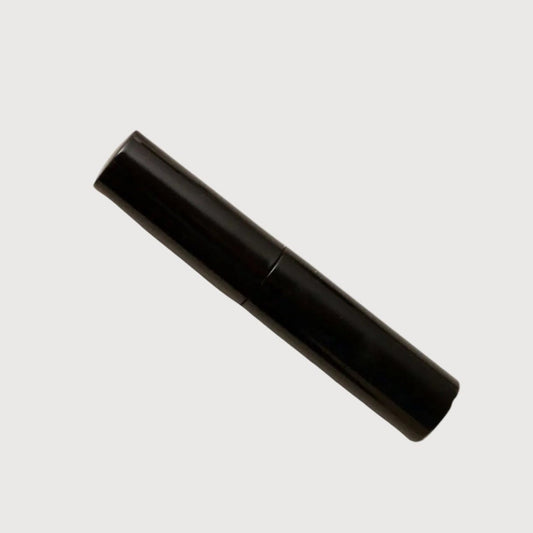 Eyelash extensions and applicators on a white background