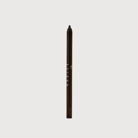 Eyebrow pencil with sample strokes on a light gray background