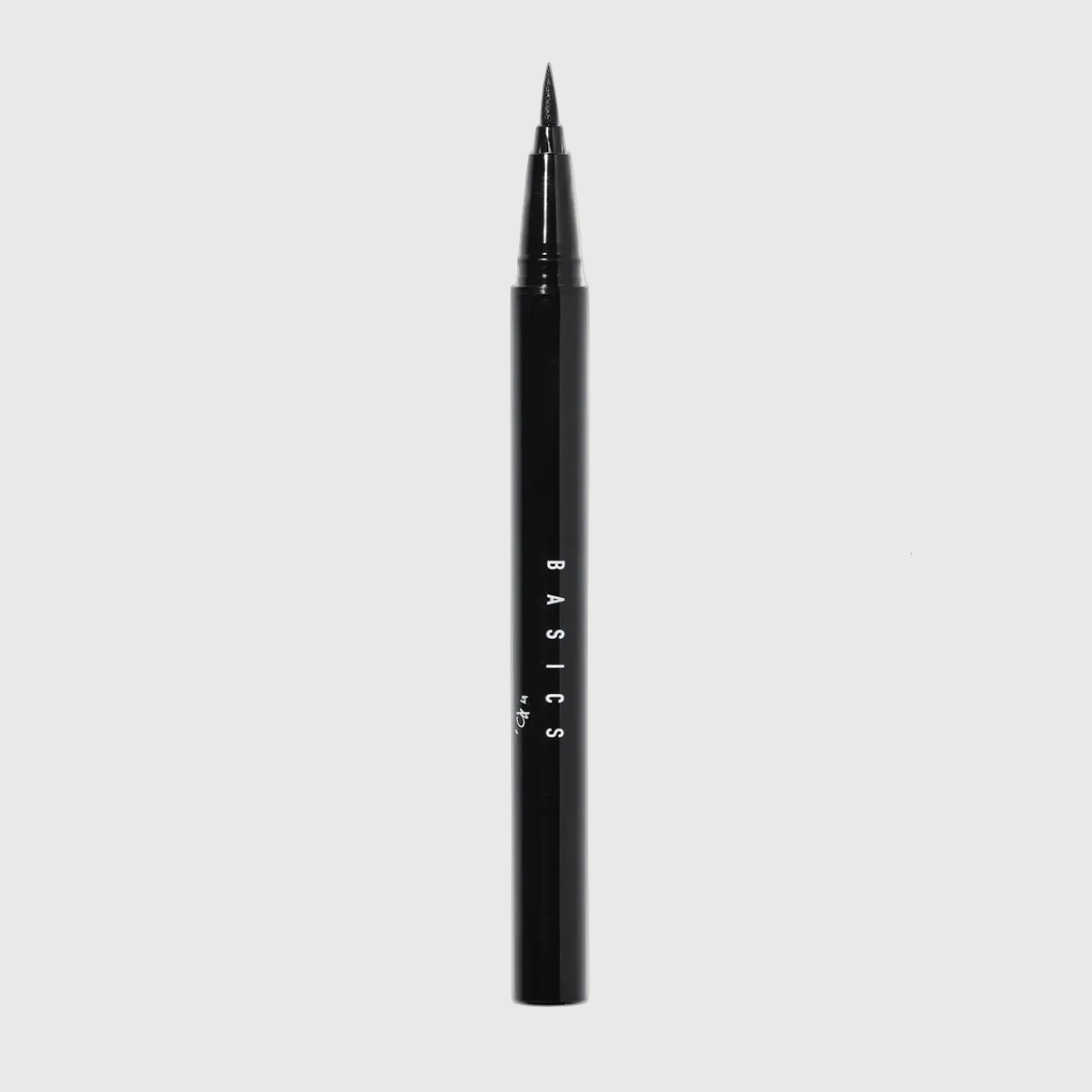 Black eyeliner pen with 'BASICS' branding on a light gray background