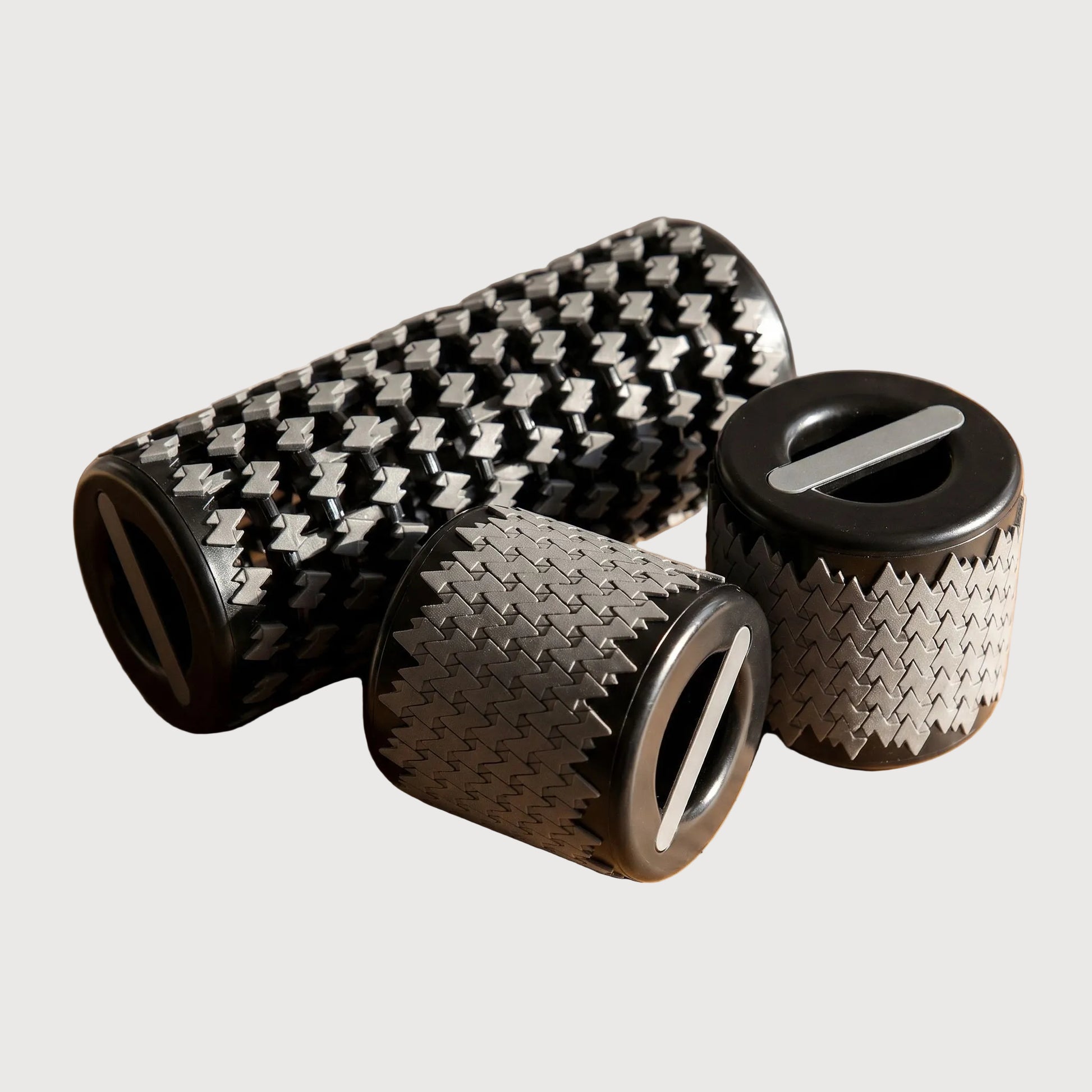 Black and white textured roller on a wooden surface
