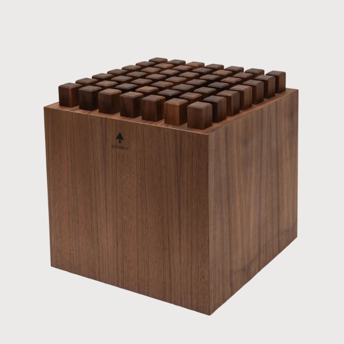 Wooden knife block with multiple knives on a white background