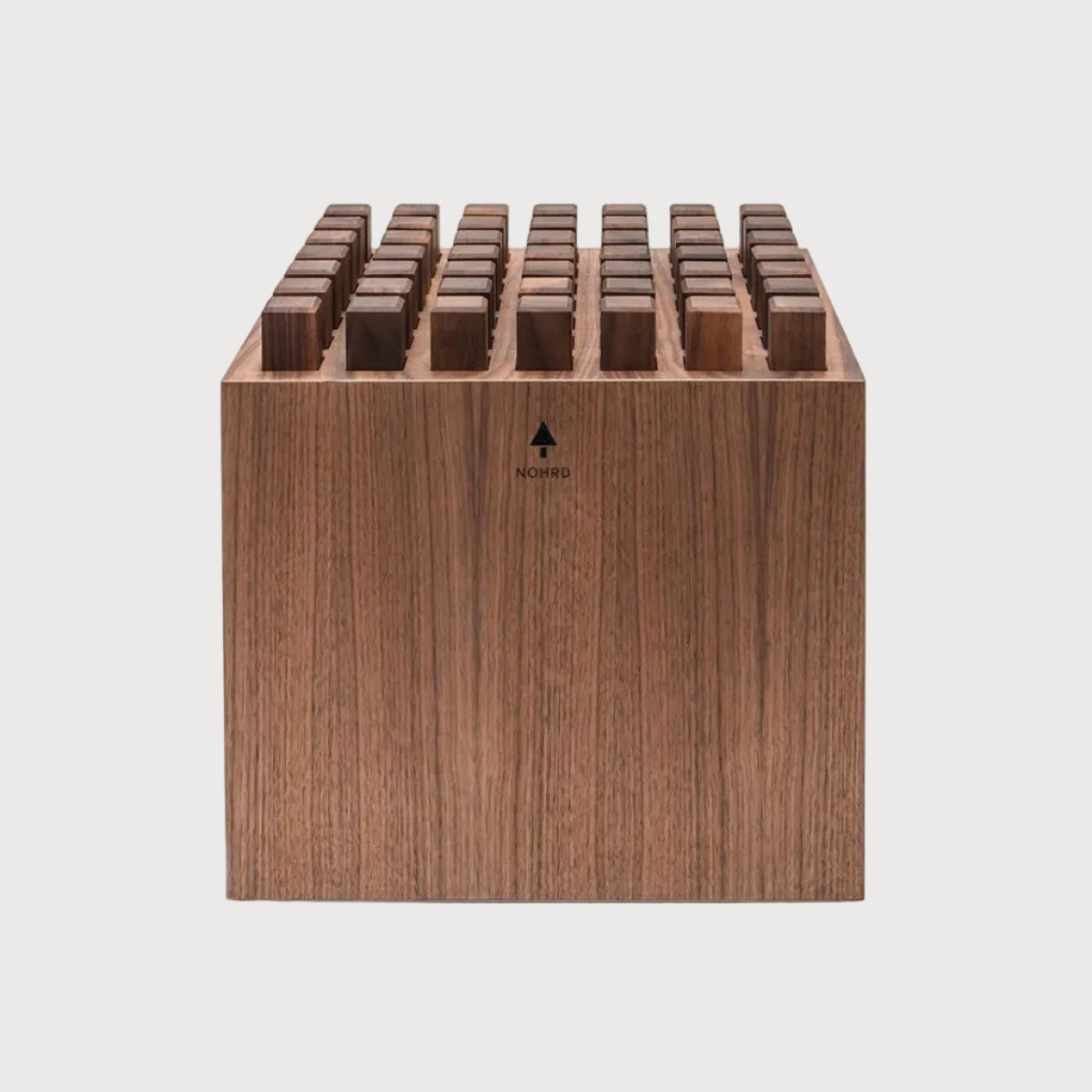 Wooden knife block with multiple slots on a white background