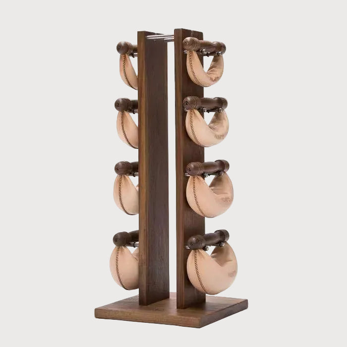 A wooden dual-handle kettlebell rack with six beige kettlebells hanging on a dark brown wooden stand against a white background.