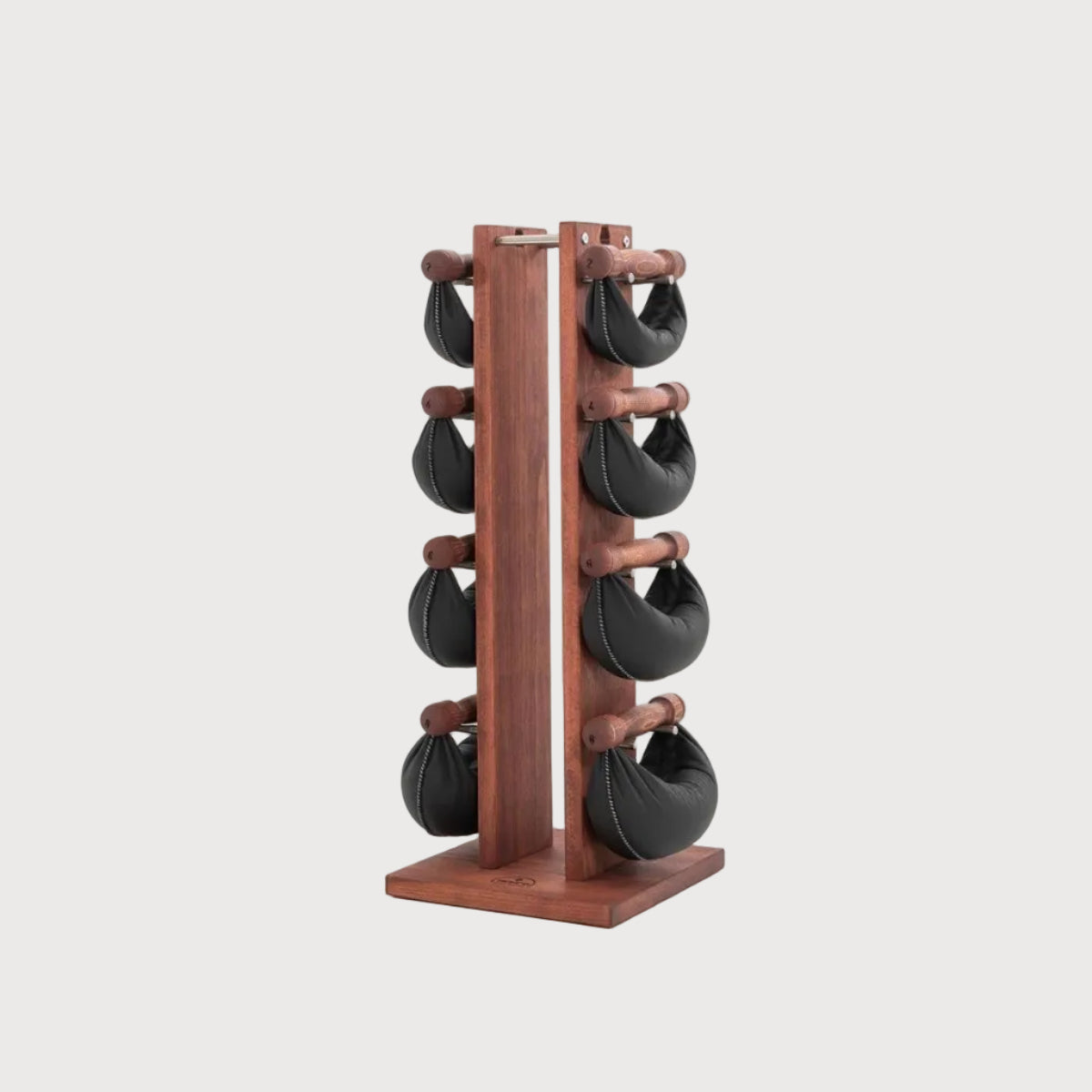 Wooden rack with black weights on a white background