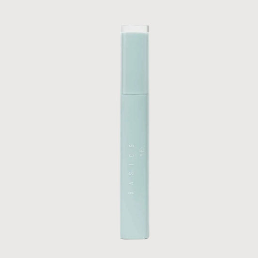 Light blue cylindrical container with white cap on a white background